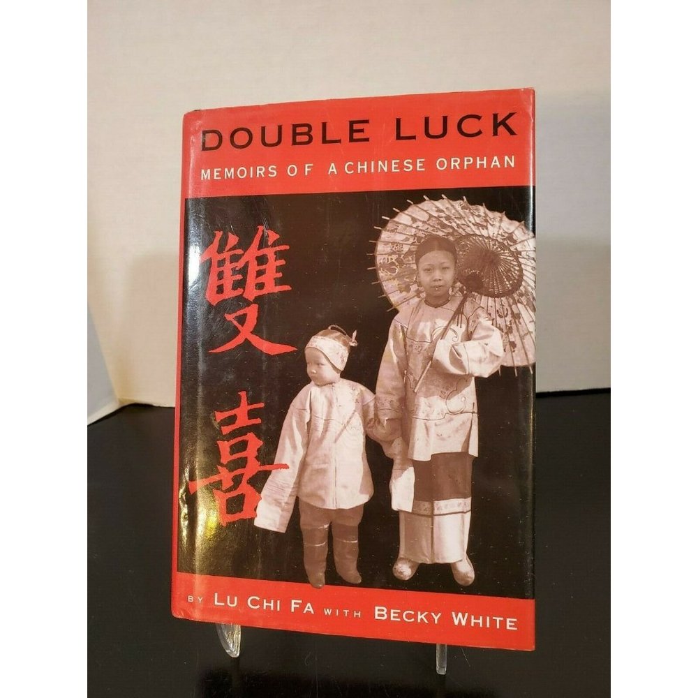 Double Luck Memoirs of a Chinese Orphan hand signe